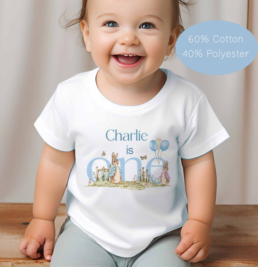 BABIES ~TODDLER~1ST BIRTHDAY~T SHIRT *PERSONALISED~ ONE ~ BLUE text Peter Rabbit